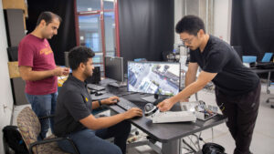 Mohammad Farhadi (left), MORE student Manthan Chelenahalli Satish (center) and Assistant Professor Yezhou “YZ” Yang (right).