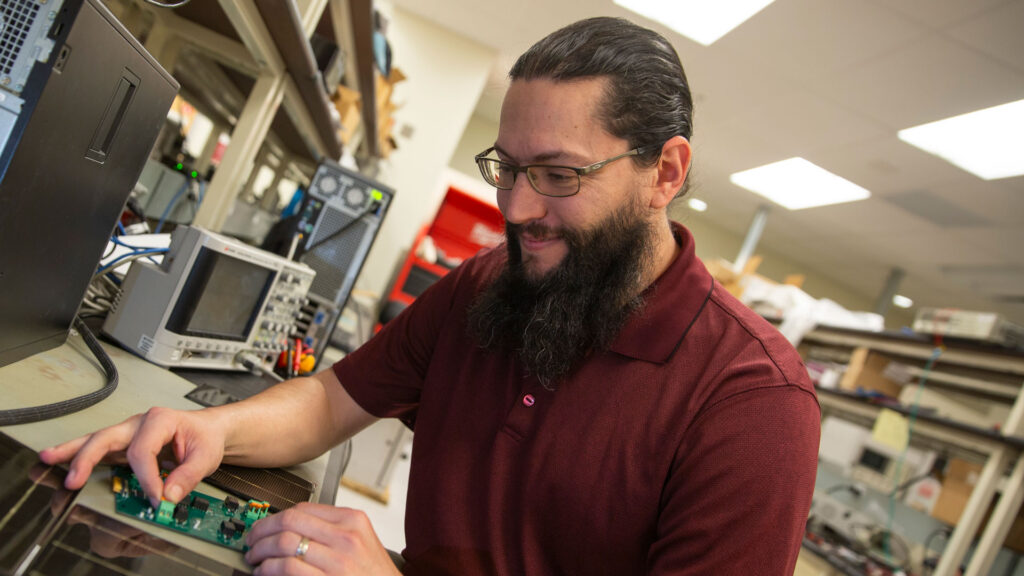 FURI student researcher Patrick Shea Jr. is creating reconfigurable solar arrays helps both in shady conditions and as the solar cells age and degrade.